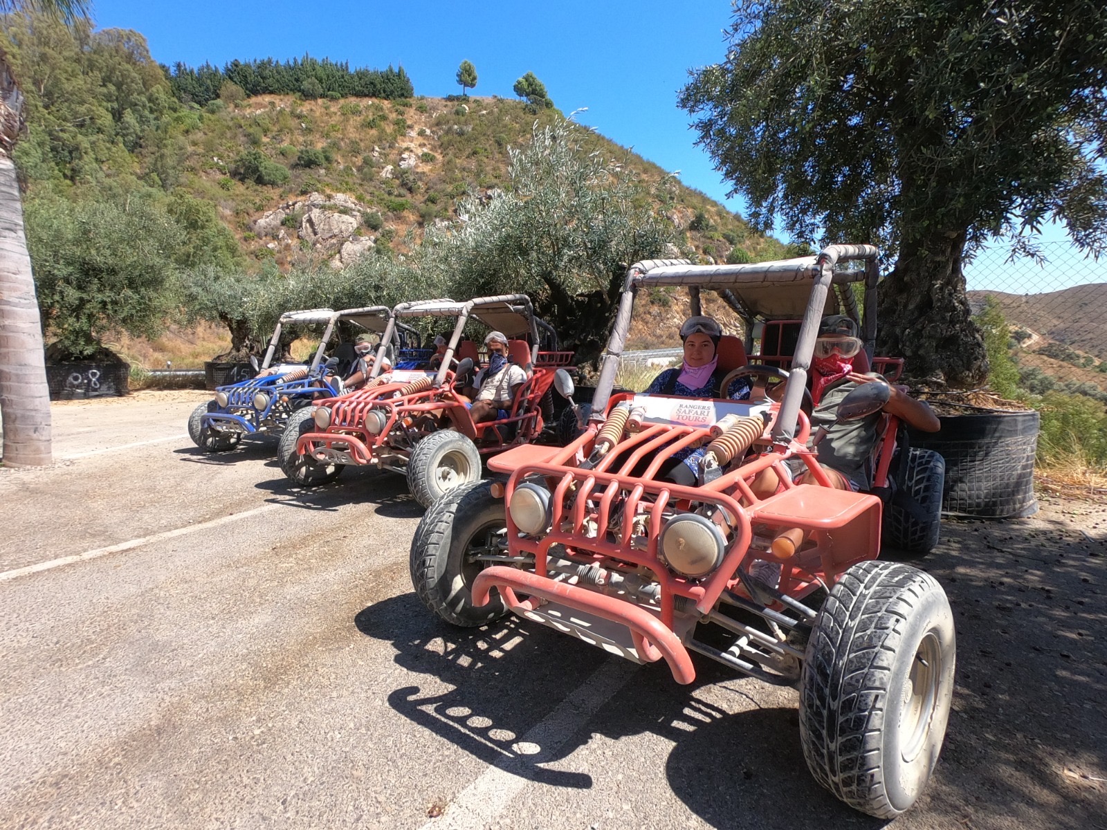 GS Moon buggies parked in a row by a mountain